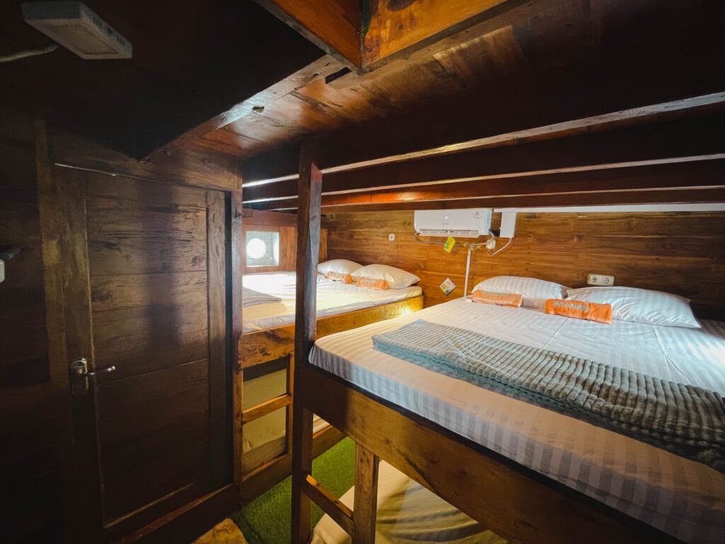 Shared cabin with stacked bunk beds and patterned bedding