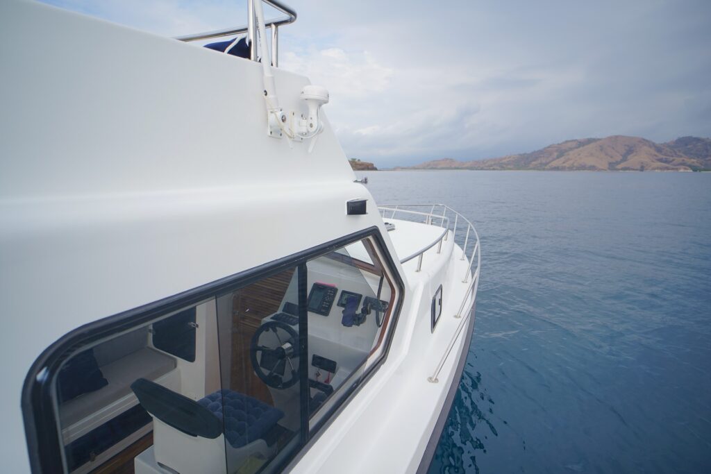 Elisa speedboat bow and cabin windows viewed close up on open water