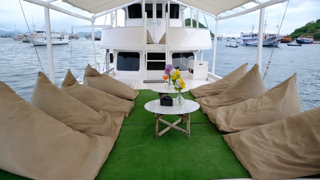 Social deck on the Giona with beanbag seating around a small table