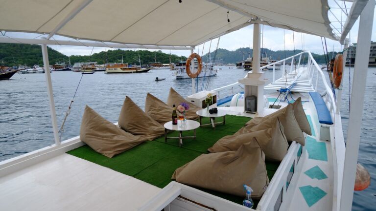 Foredeck beanbag lounge on the Giona looking toward the bow and harbor