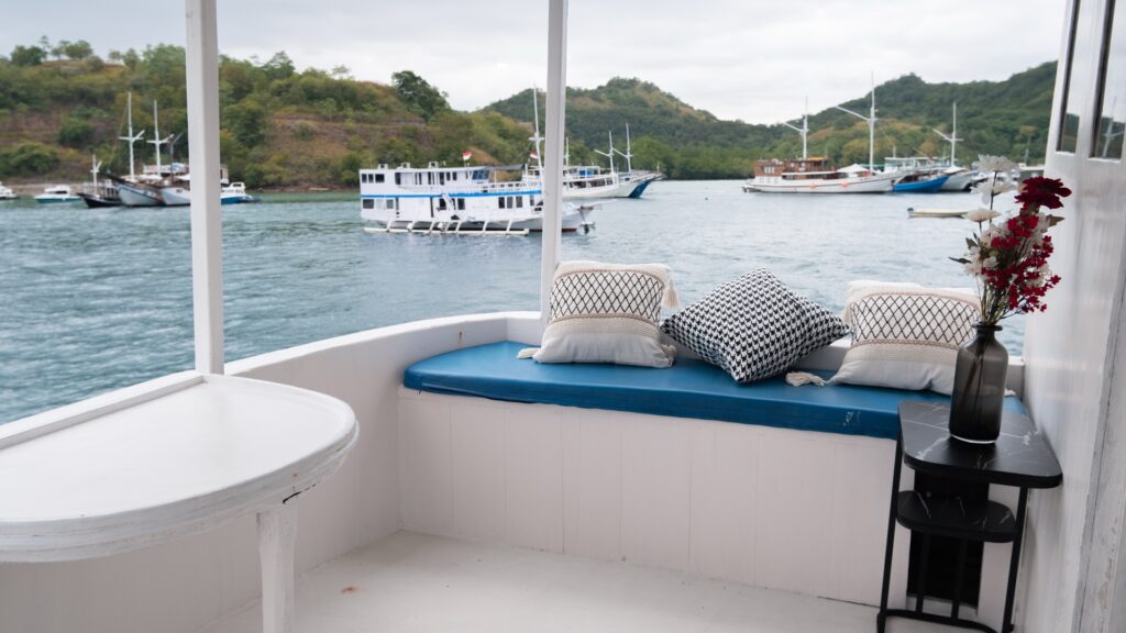 Private balcony bench beside the master suite overlooking the Komodo harbor