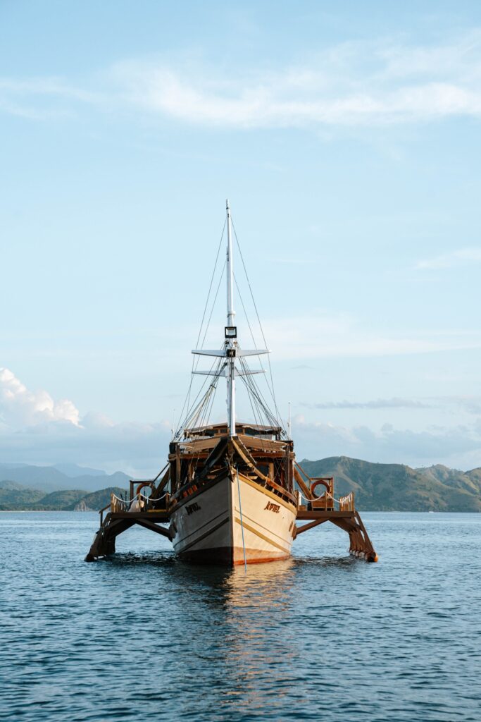 Jofiel komodo liveaboard front view showing its outrigger hull design