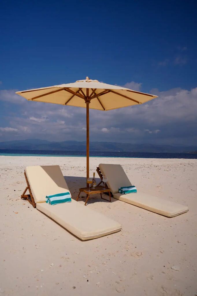 Loungers and towels set out on the beach for Kayra guests