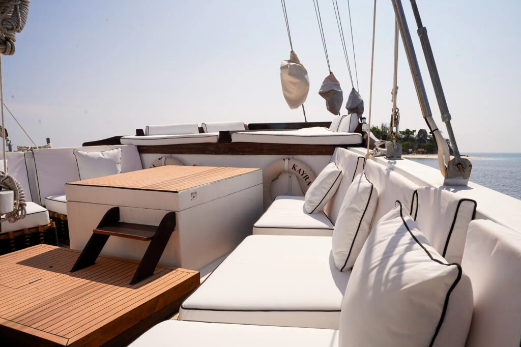 Life rings mounted along the bow deck rail of Kayra