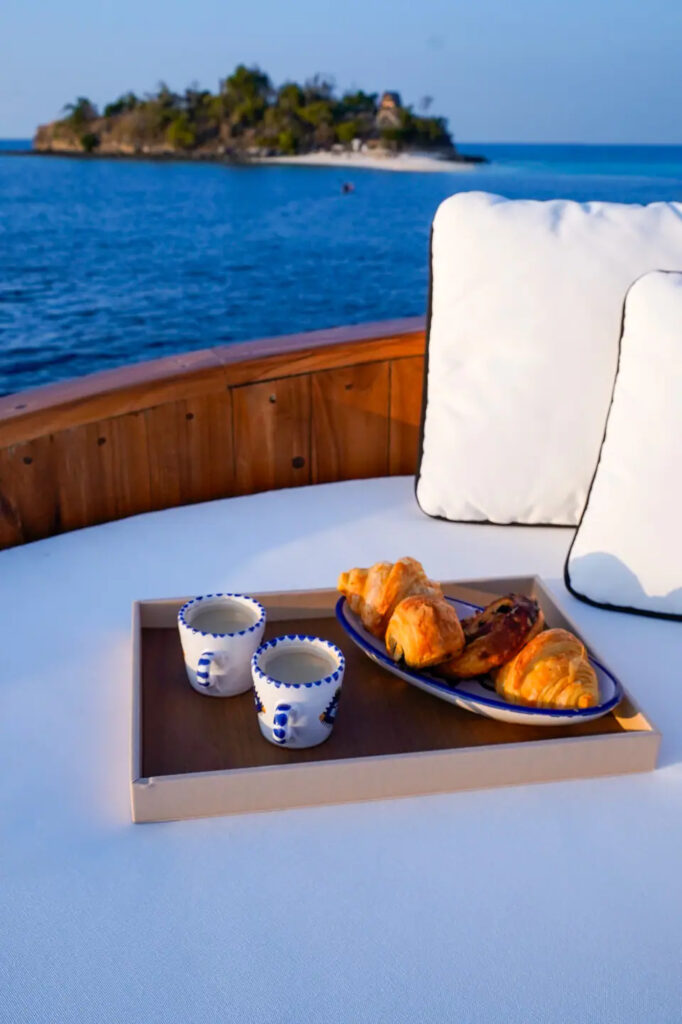 Breakfast tray with croissants served aboard Kayra
