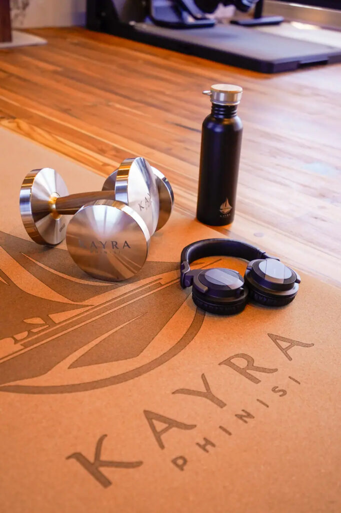 Free weights and headphones in the Kayra onboard gym