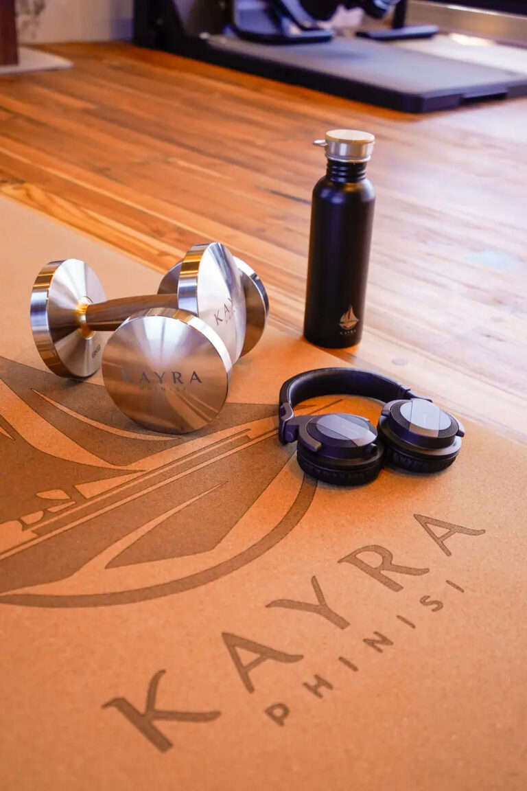 Free weights and headphones in the Kayra onboard gym