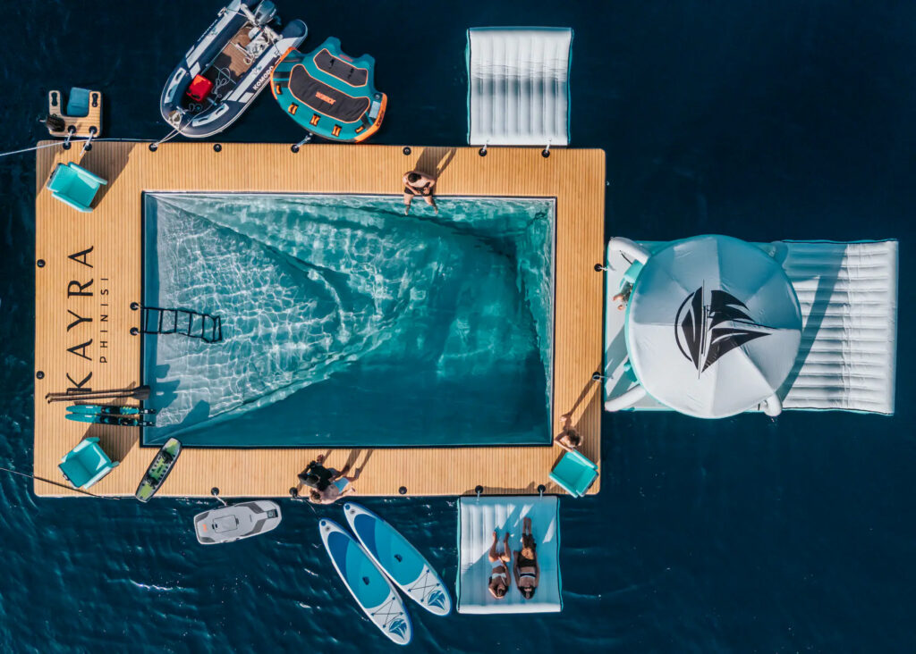 Guests in the floating pool platform alongside Kayra