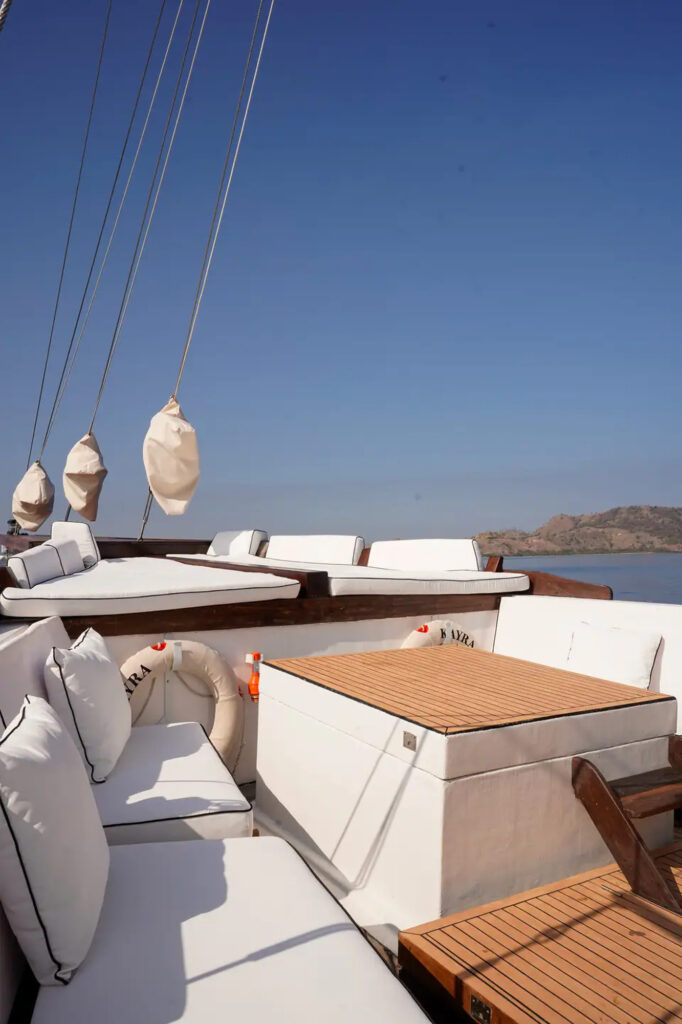 Daybeds and a low table on the Kayra sun deck